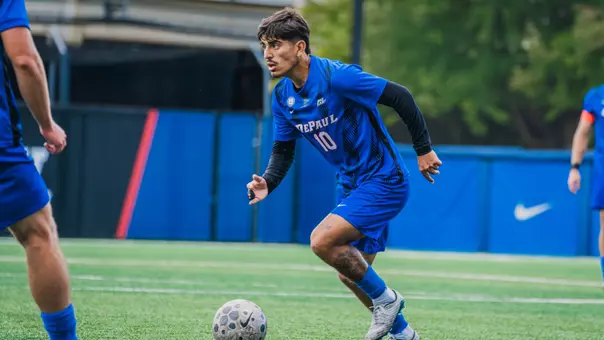 Noeh Hernandez dribbles down the field