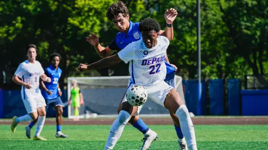 Jordan Clagette fends off defender