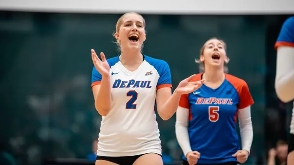 Amanda Saeger and Eva Hurrle celebrate a point