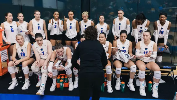 Volleyball team huddle