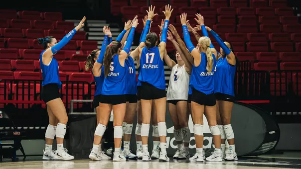 Volleyball team huddle celebration
