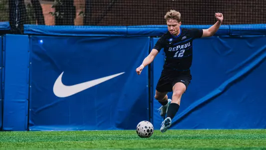 Gavin Netzel kicks the soccer ball