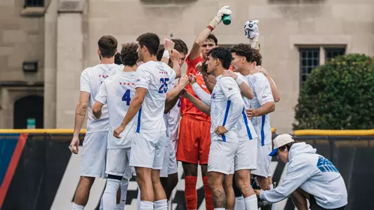 Men's Soccer Team Huddle vs. Xavier 9/18