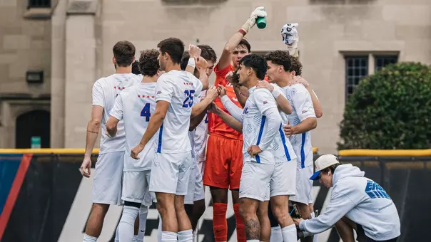 Men's Soccer Team Huddle vs. Xavier 9/18