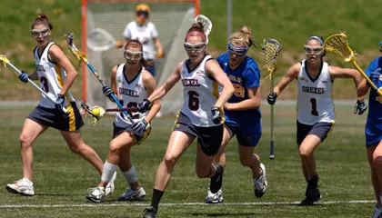 Dragons Topple 18th-Ranked Delaware on Senior Day, 15-9 Image