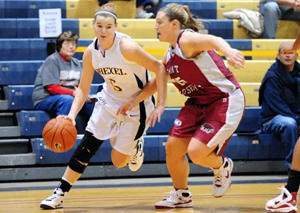 Marginean, Dragons Surge Past Saint Joseph's, 76-61, in Home Opener Image