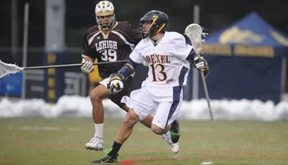 Dragons Fall in Overtime Heartbreaker Against Hofstra in CAA Championship Final Image