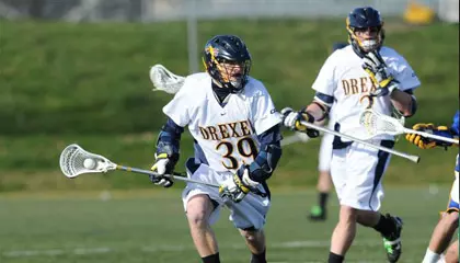 Men's Lacrosse Falls at No. 2 Virginia, 13-7 Image