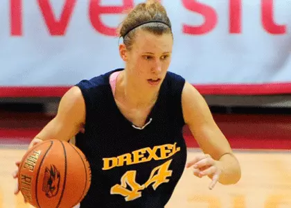 Dragons Blow Past Towson 60-41 on Homecoming at the DAC Image