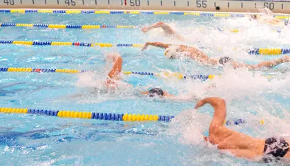 Men and Women Pick Up Victories over Widener in Swimming Season Opener Image