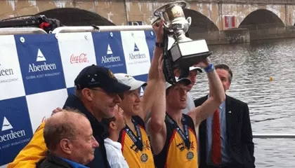 Men's varsity pair with gold