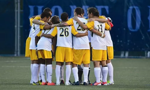 Soccer team huddle