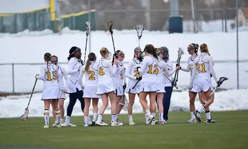 WLAX huddle