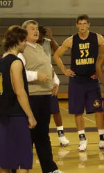 Associate Head Coach Mack McCarthy goes over a drill during practice.