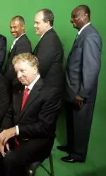 Ricky Stokes and other C-USA coaches pose for a photo during media day.