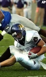 Memphis defender Wesley Smith, top, moves in for a hit on East Carolina's Bobby Good, bottom, during the third quarter. (AP Photo/The Commercial Appeal, Mark Weber)
