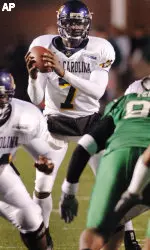 East Carolina's James Pinkney (7) drops back to pass during the second half. (AP Photo/Jeff Gentner)