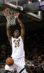 Corey Rouse dunks two of his 14 points against Wofford.