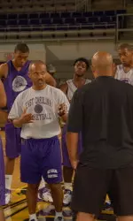 Head Coach Ricky Stokes addresses the team prior to practice.