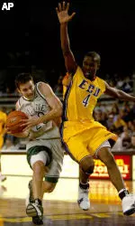 Tulane's Andrew Garcia, left, drives by East Carolina's Sam Hinnant during the second half.