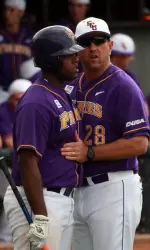 Head Coach Billy Godwin (right) talks with former Pirate Corey Kemp