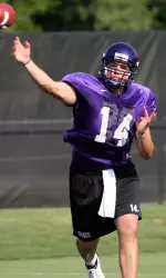 Junior QB Rob Kass attempts a pass during drills Thursday afternoon.