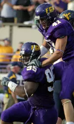 Junior C.J. Wilson (95) and Senior Zack Slate (41)