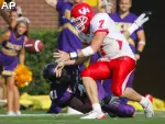 Zack Slate strips the ball from Houston quarterback Chris Pilot. (AP Photo/Karl B DeBlaker)
