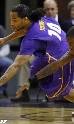 Brock Young scrambles for a loose ball against Memphis guard Willie Kemp, right, during the first half of an NCAA college basketball game in Memphis, Tenn., Wednesday, Jan. 13, 2010.  (AP Photo/Lance Murphey)