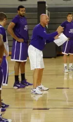 Coach Jeff Lebo goes over a drill in practice