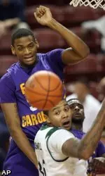 Darius Morales battles for control of the ball against Charlotte's Chris Braswell during the first half.