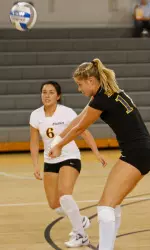 Junior Nicole Jones (6) and Amanda Lutzow set career-high marks in digs with 28 and 27, respectively