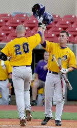 Trent Whitehead (1) congratulates Zach Wright (20) after hitting his team leading 14th home run (photo by: Thomas Shea).