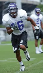 Junior defensive back Derek Blacknall leads the unit through a drill during practice.