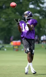 Freshman outside wide receiver Mike Price gets ready to make a catch during practice.