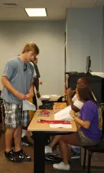 Defensive lineman Matt Milner gets his keys to Belk Dorm Thursday afternoon.