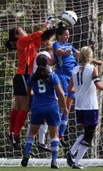 Sophomore Christiane Cordero (red) and senior Jessica Abshire (11)