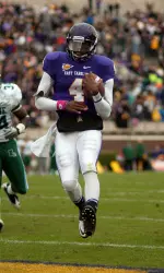 Senior Dominique Davis rushed for two touchdowns and threw for 329 yards in East Carolina's victory.