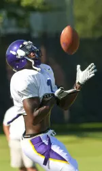 Senior outside receiver Lance Lewis hauls in a ball Wednesday morning during practice.