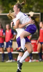 Caty Butler and Leah Bagonis celebrate ECU's first goal against UNCW