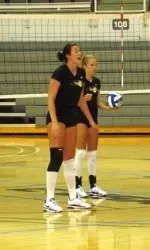 Senior Britney Roper (front) shouts encouragement to her teammates during Tuesday's practice.