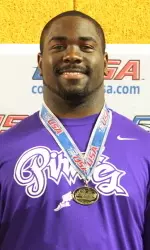Montrell Morrow displays his gold medal he received for winning the league title in the weight throw