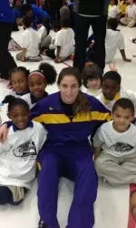 Katie Paschal visits with local kids at the