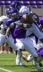RB Chris Hairston fights for extra yardage after a reception during Saturday's scrimmage.