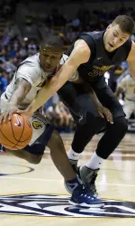 Michael Zangari battles for the ball during the first half