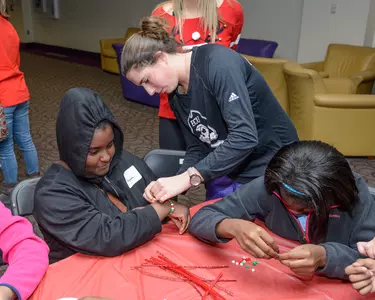 Women's Tennis Community Service