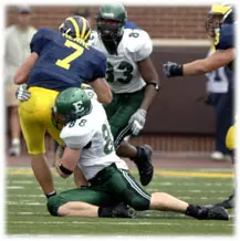 Football Falls to #14 Michigan, 55-0 Image