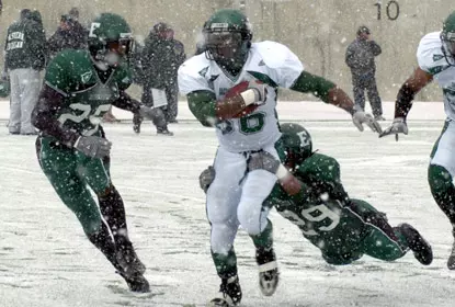 Football Caps Spring Practice with Green-White Game Image