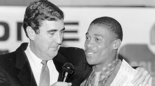 Dave Diles, Sr. (left), long-time national sports broadcaster and father of former EMU Athletics Director Dave Diles, Jr., interviews EMU’s Gary Patton prior to the 1987 California Bowl.