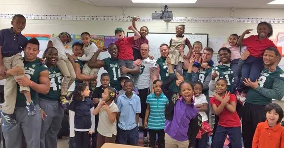 EMU Football Players Help Promote Literacy